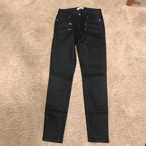 Wax coated leather look jeans